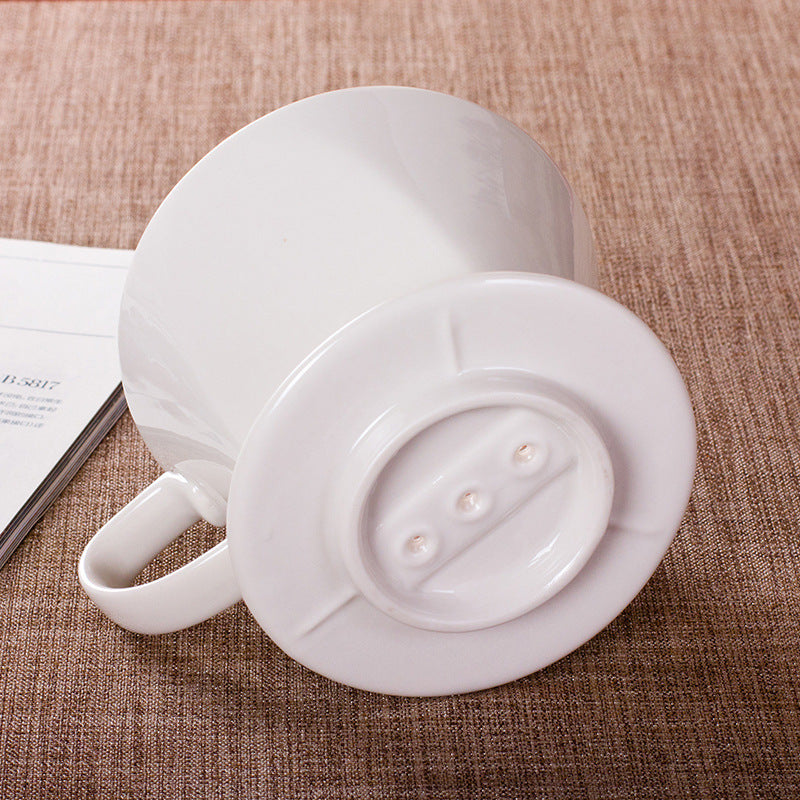 Underside of the Hearlow ceramic dripper showing the three-hole drainage base
